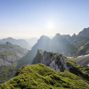 View over Alpstein Mountains into the Meglisalp Valley at sunrise