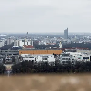 View of a city with diverse architecture and cloudy sky