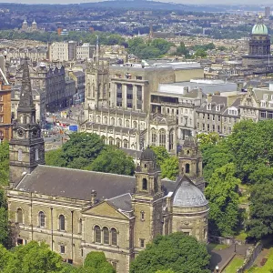 View of a cityscape with impressive architecture and lots of greenery View of a cityscape with impressive architecture and lots of greenery