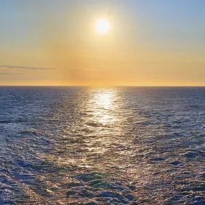 View from the cruise ship at sunrise at the stern of the ship to the stern waves View from the cruise ship at sunrise at the stern of the ship to the stern waves