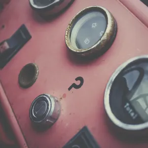 A view of the dashboard or instrument panel of an old vintage and antique car