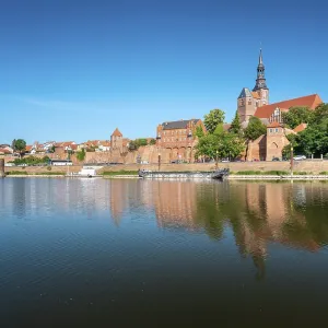 View across the Elbe harbor to the old town with St