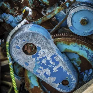 A view of the detail of an engine of an old vintage and antique machine