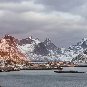 View of the fishing village Reine surrounded by rugged mountains