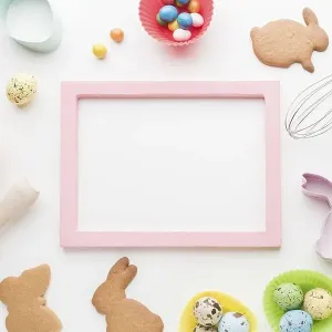 Top view frame with easter bunny cookies kitchen utensils