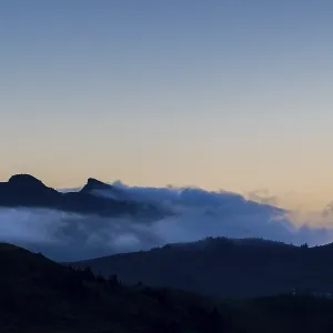 View from Furkajoch a mountain range above a sea of fog View from Furkajoch a mountain range above a sea of fog