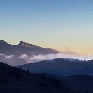 View from Furkajoch a mountain range above a sea of fog View from Furkajoch a mountain range above a sea of fog