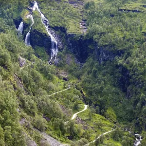 View on harpin bend road and waterfall from the most beautiful train journey Flamsbana between Flam