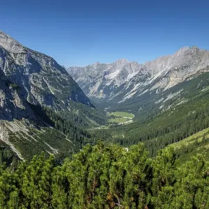 View to the Karwendeltal valley with Karwendelspitze and Hochkarspitze View to the Karwendeltal valley with Karwendelspitze and Hochkarspitze