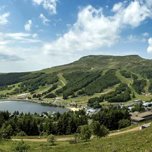 View of Lac des Hermines and Super-Besse winter sports resort in Auvergne Volcanoes Regional Nature Park