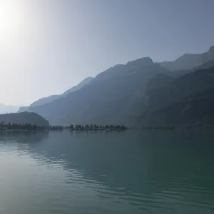 View over Lake Brienz with Mountain and Sunlight in Brienz View over Lake Brienz with Mountain and Sunlight in Brienz