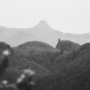 View of misty hills and mountains in black and white