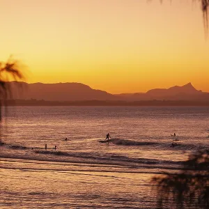 View of the ocean and Wategos Beach on the promenade at sunset View of the ocean and Wategos Beach on the promenade at sunset