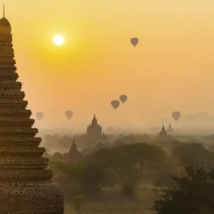View of pagodas with hot air balloons