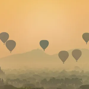 View of pagodas with hot air balloons View of pagodas with hot air balloons