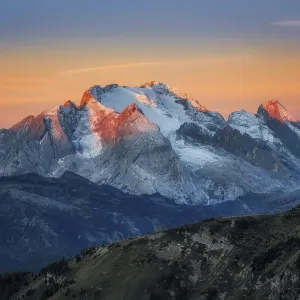 The view from Passo Giau to the Marmolada massif after colour sunrise The view from Passo Giau to the Marmolada massif after colour sunrise