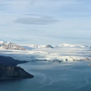 View from the top of Pyramiden Mountain over the fjord to Nordenskioeld Glacier View from the top of Pyramiden Mountain over the fjord to Nordenskioeld Glacier