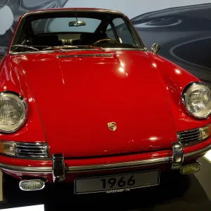 Front view of a red Porsche classic car from 1966