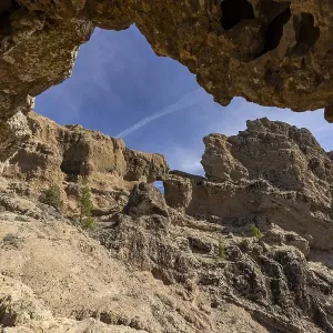 View through rock arch to another rock arch