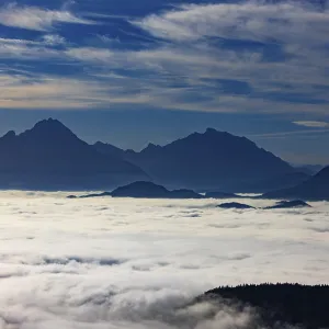 View from Schwarzenberg to a sea of fog in the Salzach valley with Watzmann