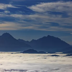 View from Schwarzenberg to a sea of fog in the Salzach valley with Watzmann