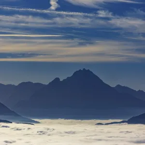 View from Schwarzenberg to a sea of fog in the Salzach valley with Watzmann