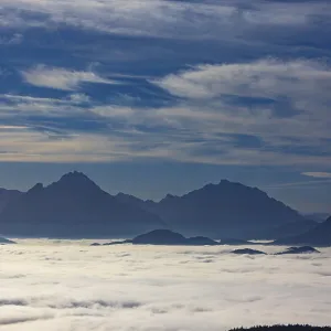 View from Schwarzenberg to a sea of fog in the Salzach valley with Watzmann