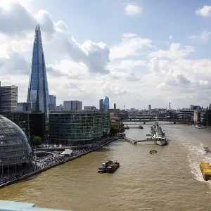 View of The Shard tower and Thames River with boats