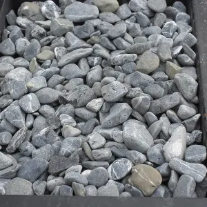 Top view of smooth pebbles and stones texture for garden landscaping and decoration Top view of smooth pebbles and stones texture for garden landscaping and decoration