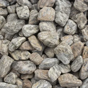 Top view of smooth white pebbles and stones texture for garden landscaping and decoration