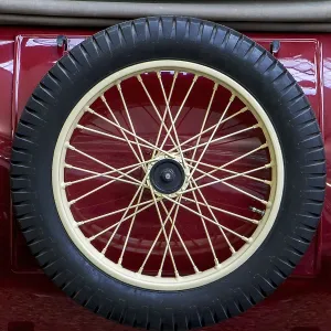 The back view of vintage car with spare wheel The back view of vintage car with spare wheel