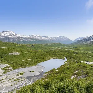View of the wide valley of the Tsina River with mountains