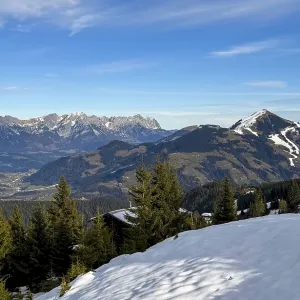 View of Wilden Kaiser and Hohe Salve from Rosskopf summit in winter