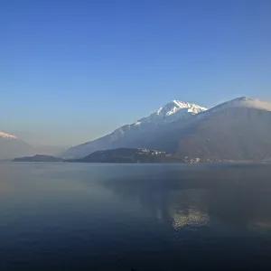 Village on Lake Como with Snow-capped Mountain in Lombardy Village on Lake Como with Snow-capped Mountain in Lombardy