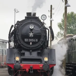 Vintage black steam locomotive from The Veluwsche Steam Train Company in Beekbergen in the Netherlands