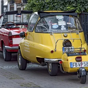 Vintage BMW Isetta 300 motor coupe with trailer