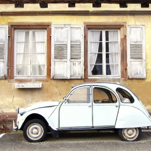 Vintage car ente in french village wissembourg Vintage car ente in french village wissembourg