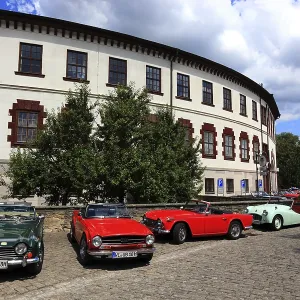 Vintage car parade in front of the castle