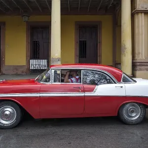 Vintage car, red and white, 1950s Vintage car, red and white, 1950s