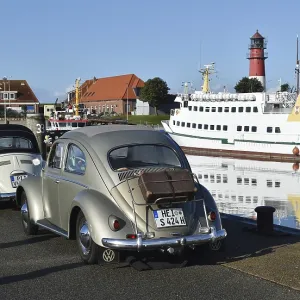 Vintage car, VW Beetle convertible at vintage car meeting at Buesum lighthouse Vintage car, VW Beetle convertible at vintage car meeting at Buesum lighthouse