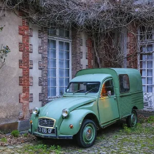 Vintage Citroen 2CV duck in a courtyard