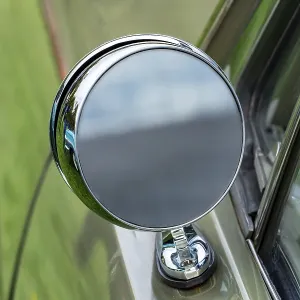 Vintage outside rear mirror of an old-timer Vintage outside rear mirror of an old-timer