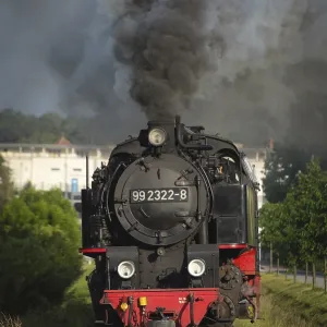 Vintage steam locomotive full steam ahead