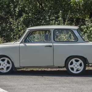 Vintage Trabant car side view closeup in sunny day Vintage Trabant car side view closeup in sunny day