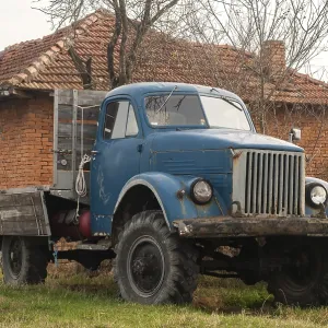 Vintage truck closeup to rural country house Vintage truck closeup to rural country house