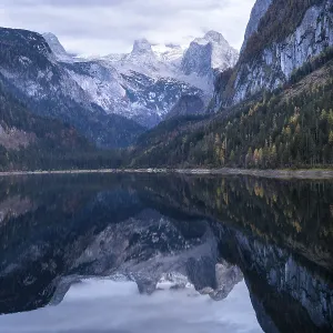 The Vordere Gosausee lake in autumn with a view of the Dachstein mountain range The Vordere Gosausee lake in autumn with a view of the Dachstein mountain range