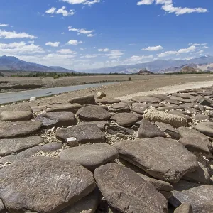 Wall with sacred Mani stones in Ladakh
