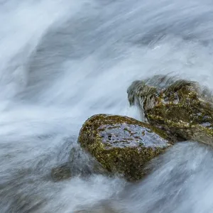 Water laps rocks in Gartel waterfall in Hohe Tauern National Park Water laps rocks in Gartel waterfall in Hohe Tauern National Park