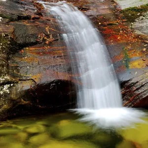 Waterfall in autumn landscape, Heihe National Park