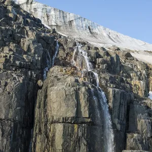 Waterfall in a glacier on Alkefjellet Waterfall in a glacier on Alkefjellet